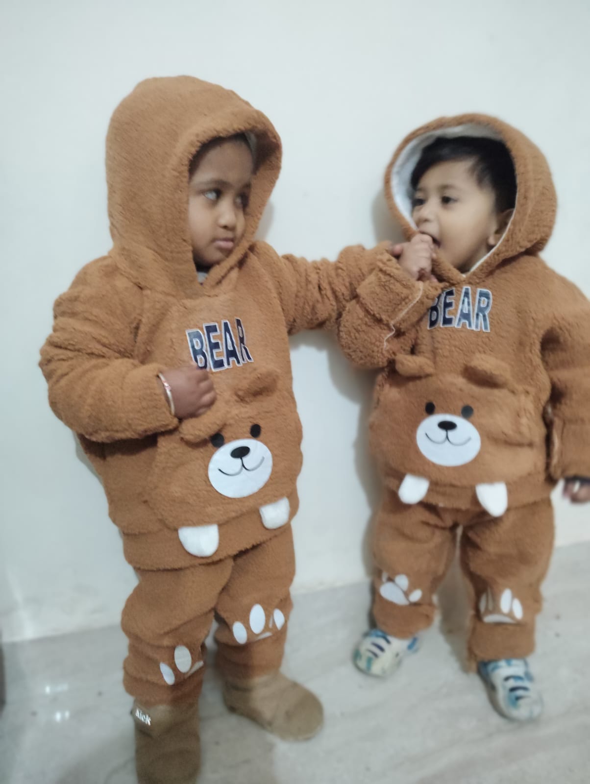 Cute toddler in bear suit
